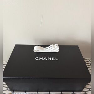 Chanel Black empty  box with wrapping paper, great condition with a tie
